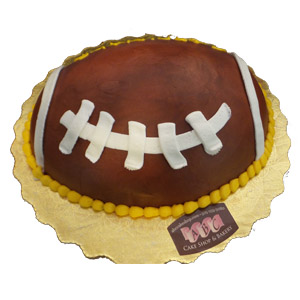 2223) Football Shaped cake - ABC Cake Shop & Bakery